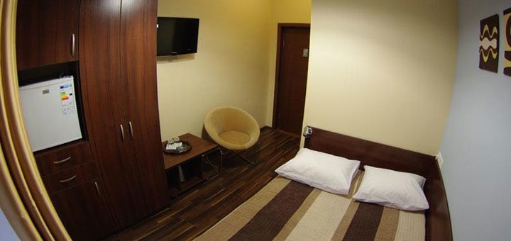 A room at the Darnitsky Hotel in Kyiv. Book a room with a discount. Cheap hotels in Kyiv.