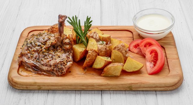 Meat dishes at the TerraMare cafe-restaurant in Vinnitsa. Order European cuisine at a discount.