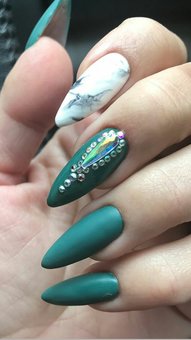 Nail extension with design in the Figura beauty salon in Kryvyi Rih. Come for the promotion.