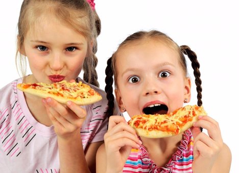 Children's pizza at the Home Pizzeria pizzeria in Kiev. Order pizza for a promotion.