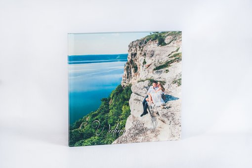 Фотокнига 30х20 в студии «Fotobook Plus». Заказывайте по скидке.